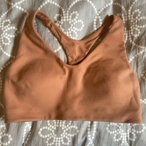 Lululemon in alignment racer back sports bra size 8 pink savanna like new